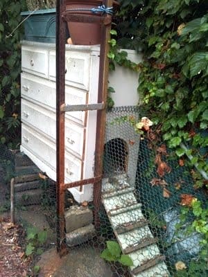 An old country chicken coop out of a recycled chest of drawers