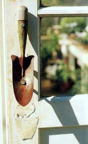 Creating Whimsy In Your Backyard & Garden, Part Two A shabby chic door pull made out of a trowel