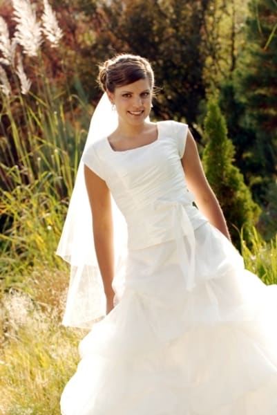 From Church To Wedding To Black Tie Event: Getting Dressy. A graceful bride in her wedding dress.