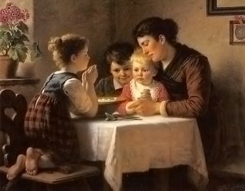A mother praying with children