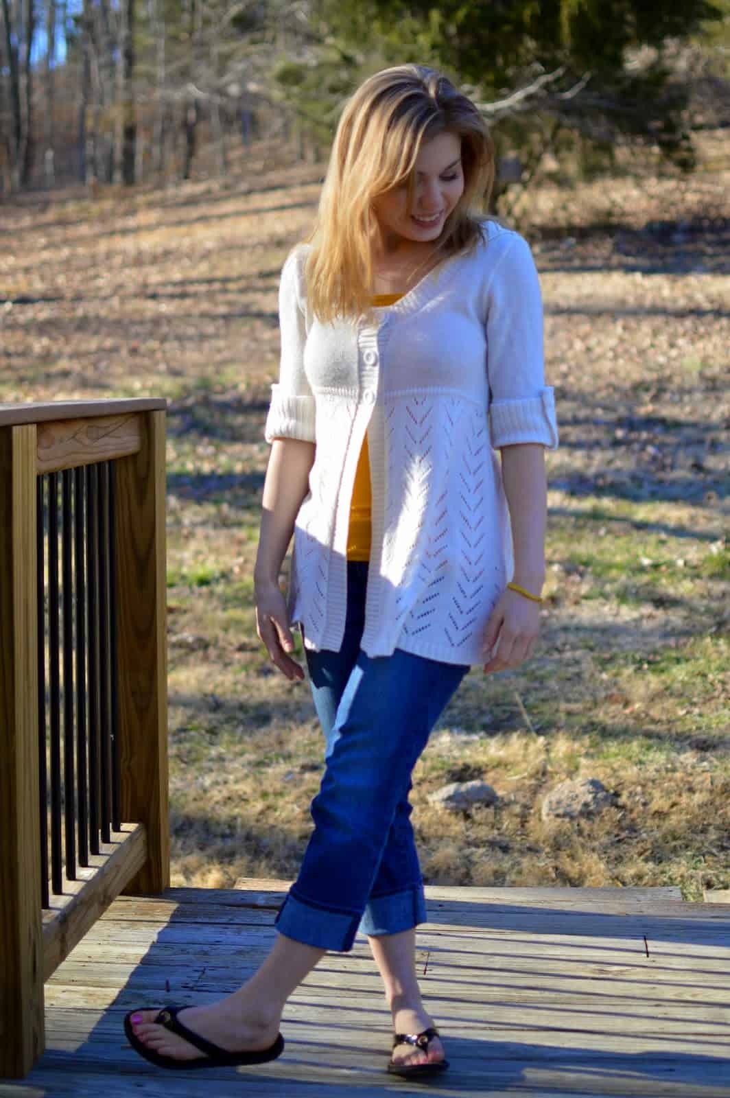 Feminine girl in jeans, tunic top and sweater, 3/4 sleeve, 