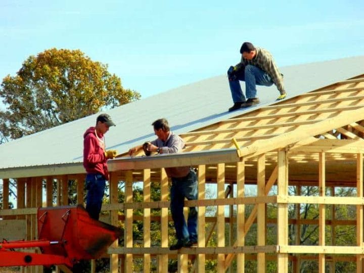 Moldable Boys: Raise Them to be Competent, Hard-Working & Masculine. Putting on a new roof... father and sons working construction
