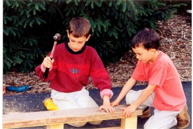 Moldable Boys: Raise Them to be Competent, Hard-Working & Masculine. Two brothers building with hammer and nails