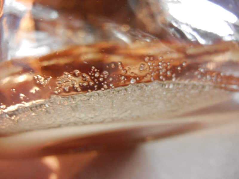 A Complete Beginner's Guide To Brewing Your Own Kombucha. dissolving sugar in black tea
