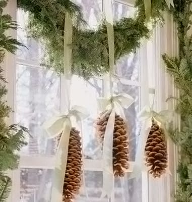 pine cones hung by ribbons, Christmas decorations, natural