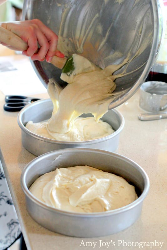 White Chocolate Raspberry Torte Recipe & Tutorial. pouring cake batter into cake pans, 