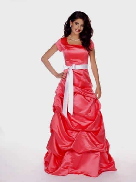 From Church To Wedding To Black Tie Event: Getting Dressy. A satin prom dress in watermelon.