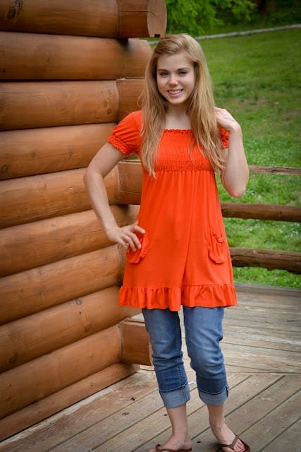 orange tunic and comfy jeans