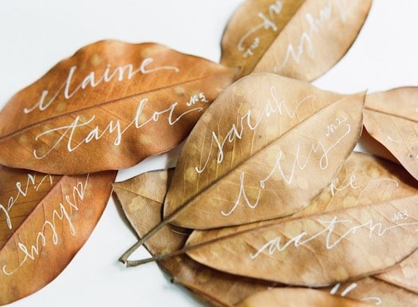 Name place cards hand written in a silver ink.