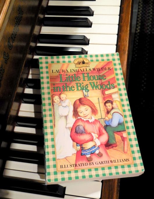 Little House In the Big Woods book on piano keys