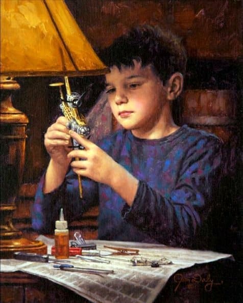 Are We Starving The Hearts Of Our Children? a older boy building model airplane
