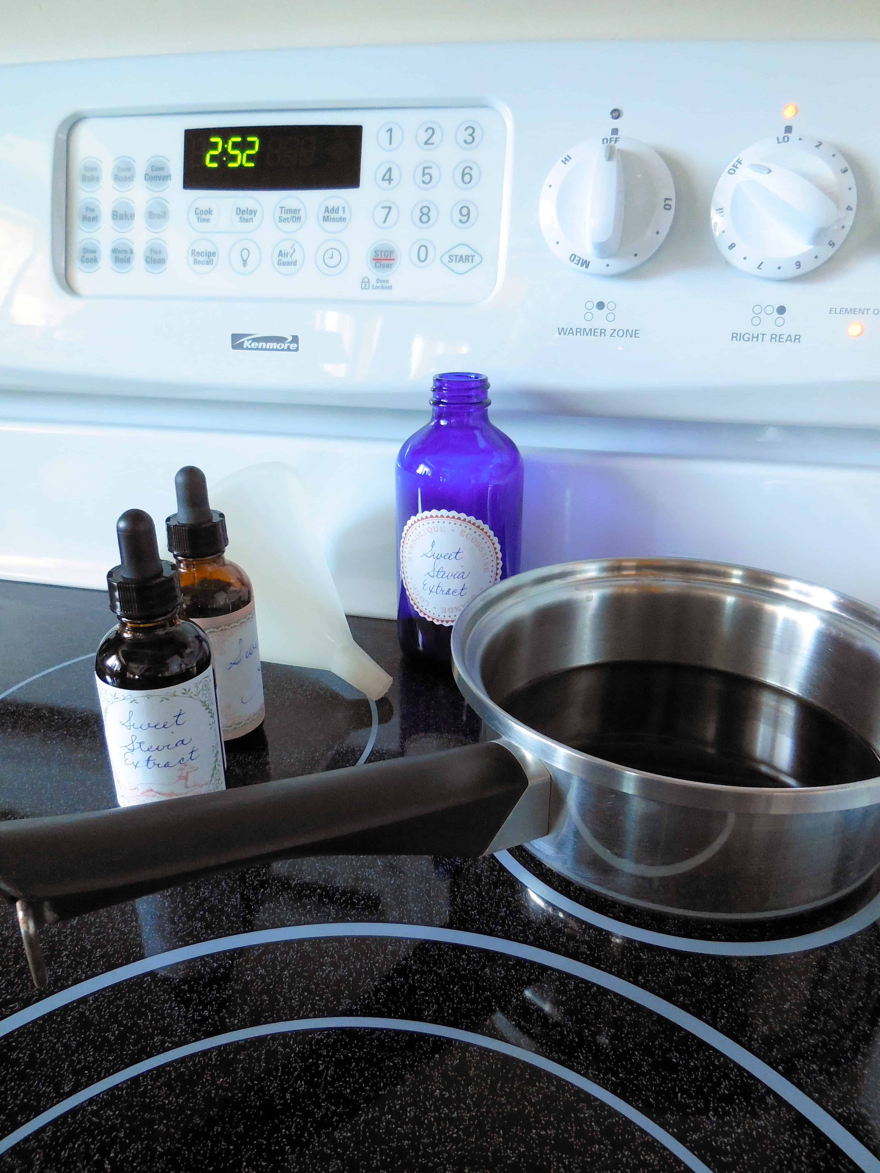 Make Your Own {Non-Processed} Stevia Extract {& Why I Do It}. sauce pan on low temperature to dehydrate extract