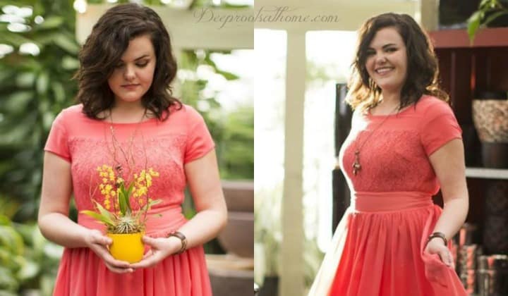 The Plus Size Woman: Put-Together, Attractive, Feminine Dressing, A young woman, elegantly curved, in a classy coral summertime dress.
