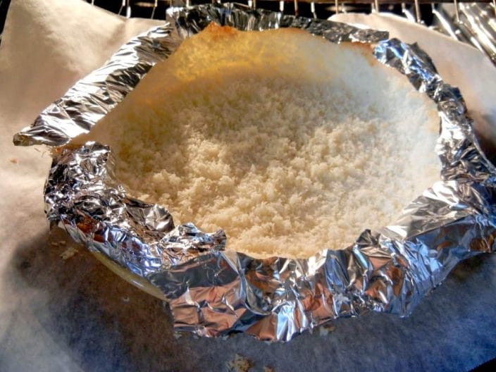 Perfect Coconut Pie Crust Every Time {Easy}, Foil on pie crust edges in oven