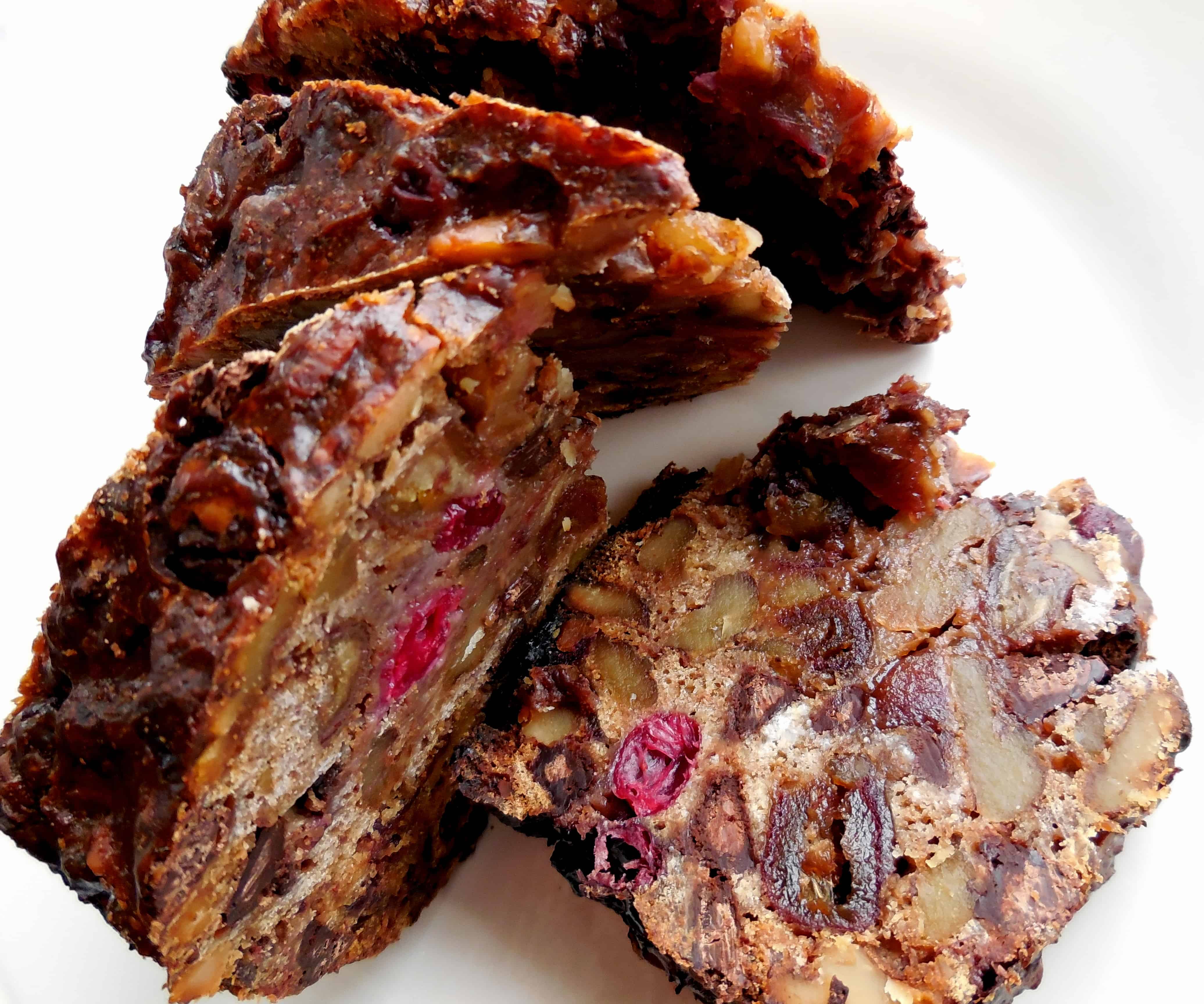 Festive Chocolate Cranberry Bishop's Bread. A dessert bread with cranberries, dates, chocolate, walnuts and rum.
