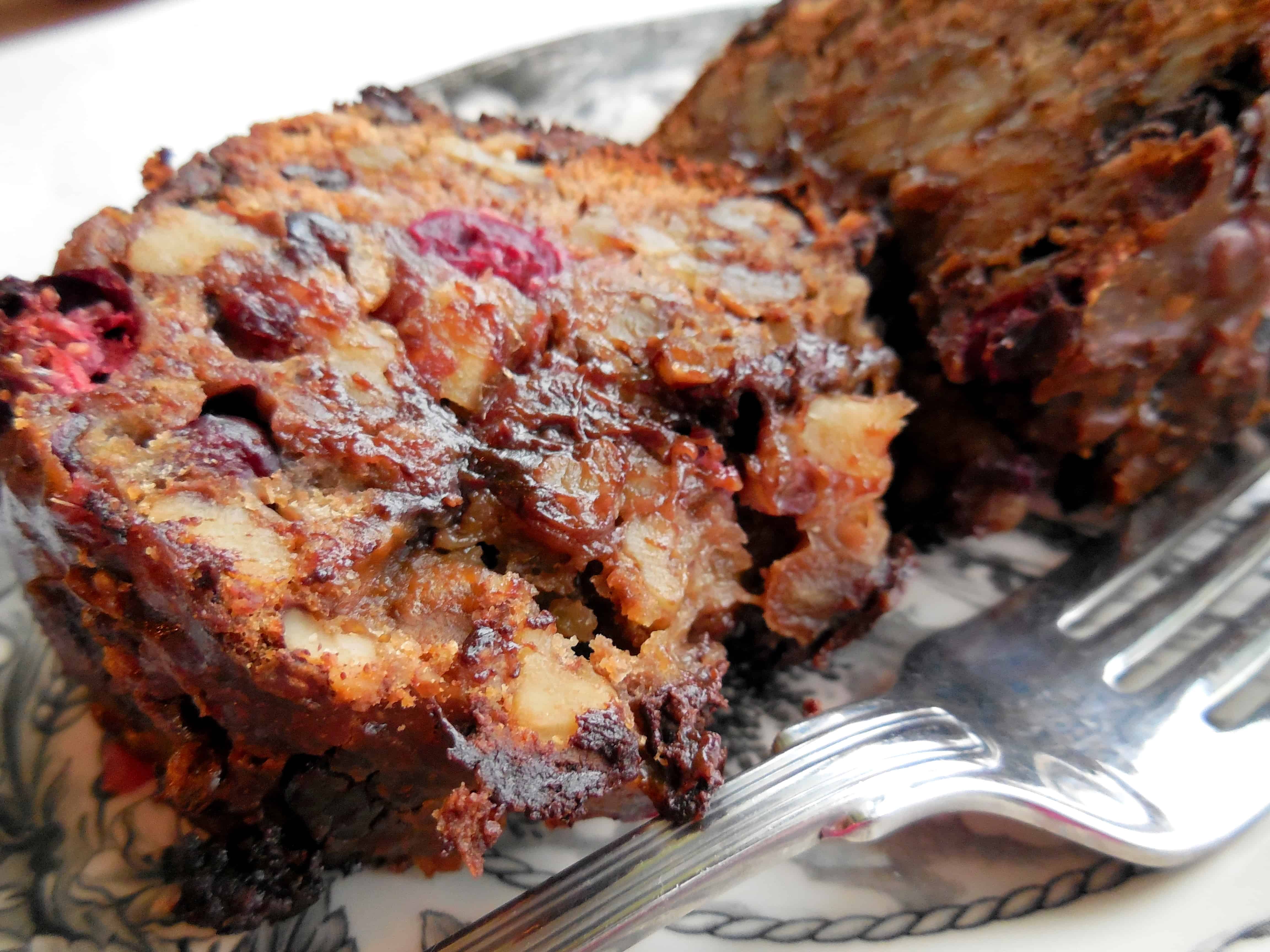Festive Chocolate Cranberry Bishop's Bread. A dessert bread with cranberries, dates, walnuts, chocolate, and rum. 