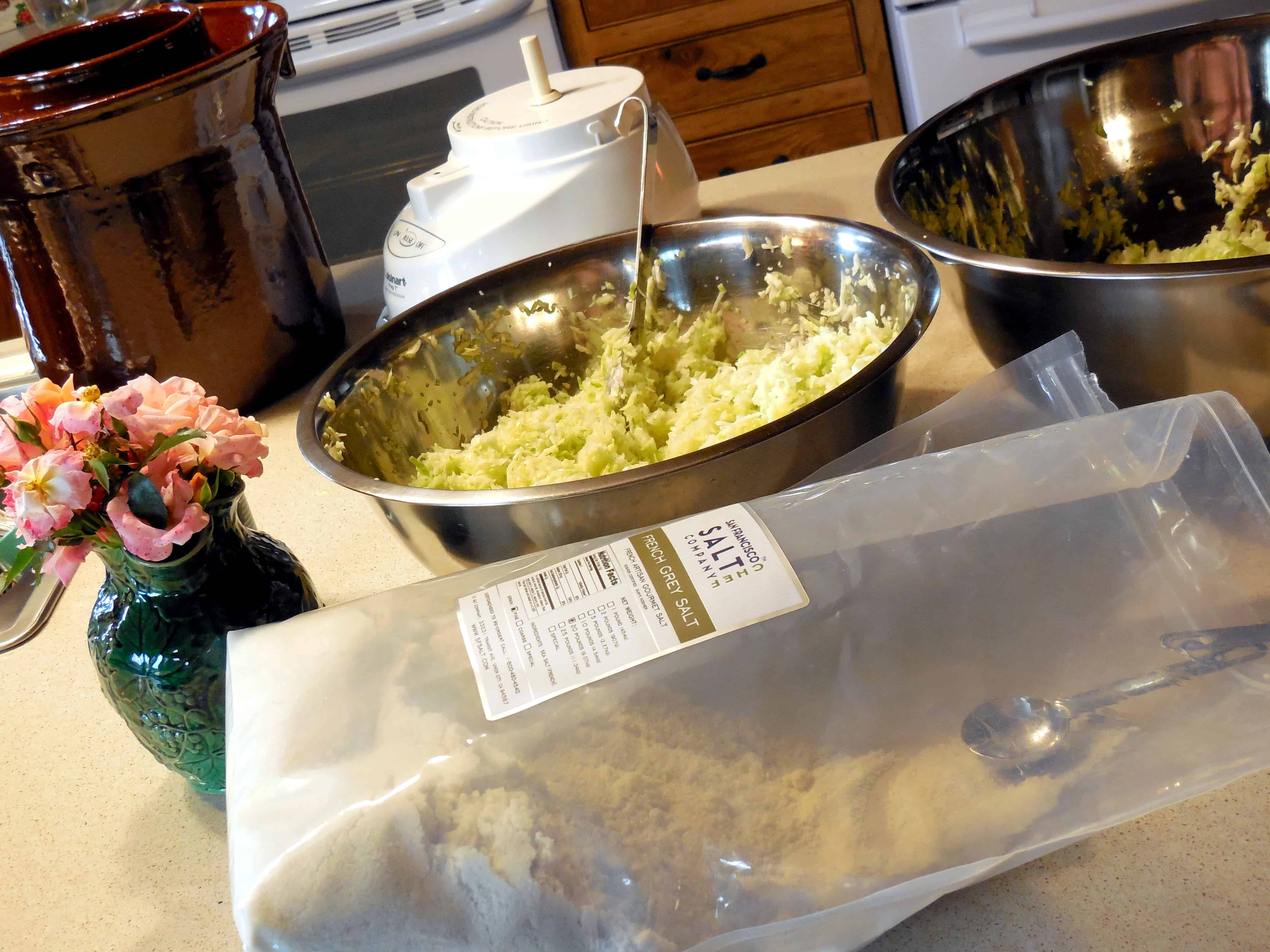 Step-by-Step Process Of Making Sauerkraut In a Crock, keeper at home, choucroute, barrels, book, French Grey salt, Himalayan pink salt, sea salt, minerals, shredded cabbage, chopped cabbage, independence, open crock, Boss Pickler, Fido jar, canning jars, mason jars, Ball jars, salt ratio, bon appetit, Alsace Lorraine, France, cellar, food storage, fermentation, big batches, crunchy, sour, kahm yeast, Holland, caraway seeds, lidded crock, Harsch crock, Gartopf, grandmothers, probiotic, flavor, crunchy, beneficial bacteria, bad bacteria, lactobacillus, lactic acid, brine, salt solution, lacto-fermentation, old ways, thermometer, food storage, kraut, mixing cabbage, salting