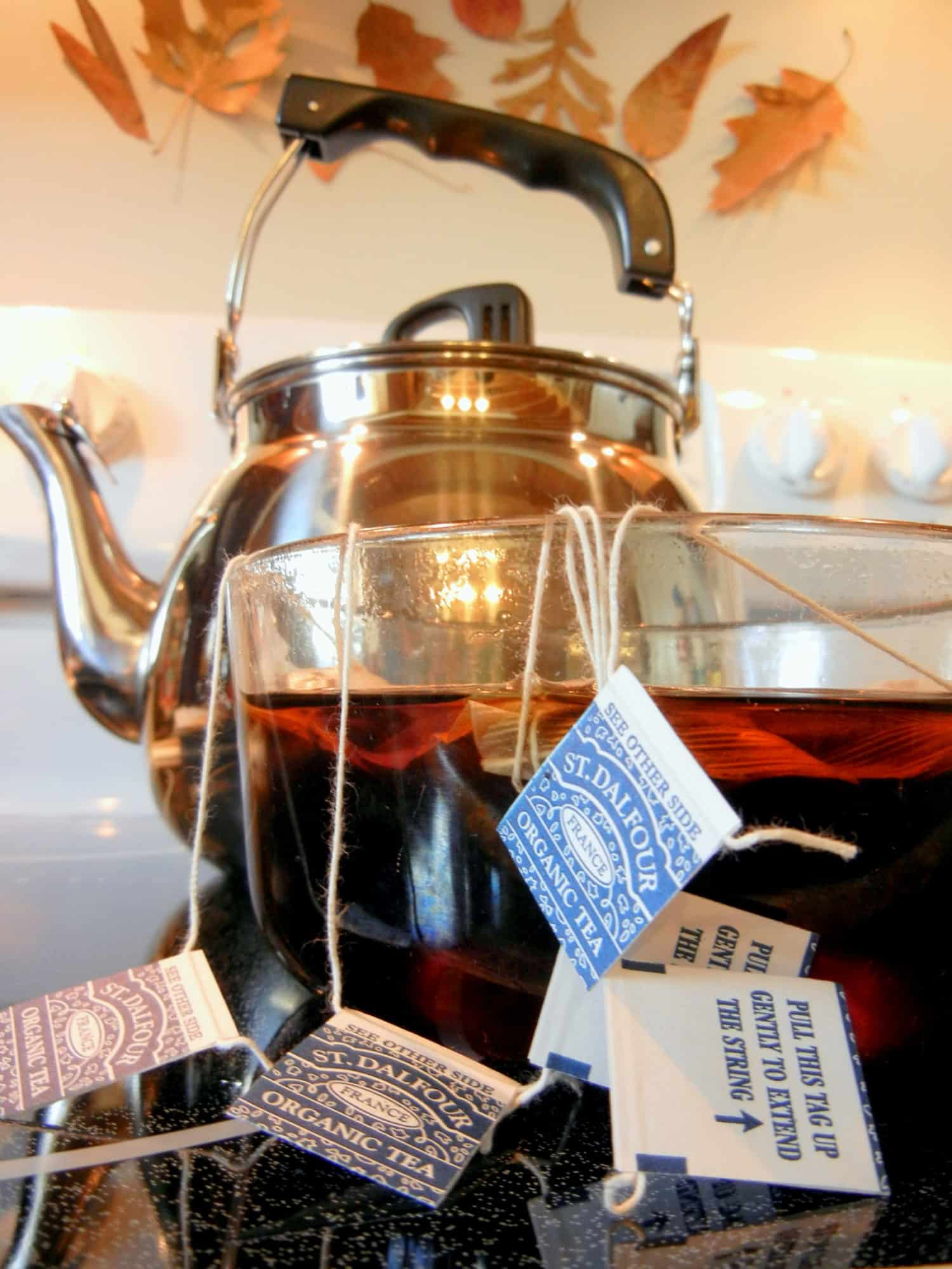 A Complete Beginner's Guide To Brewing Your Own Kombucha. steeping tea bags in boiling water