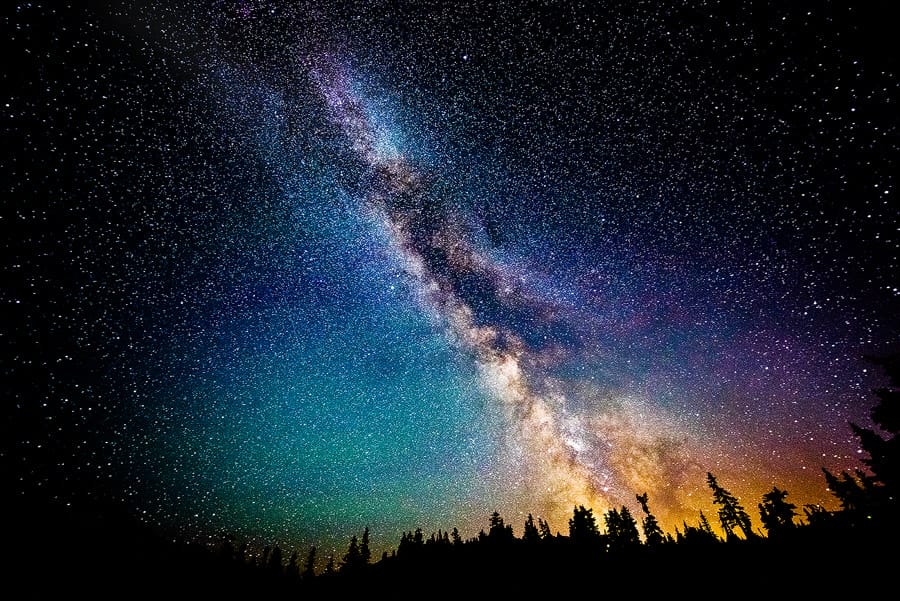 The Biggest Case for God: Science Itself An image of the greater universe with the Milky Way at night.