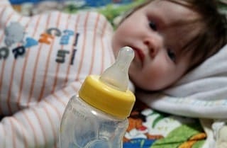Why Soy Infant Formula Is Potentially Harmful To Babies - Boys & Girls, Baby's Only Organic formula, Earth's Best, Kirkland Instant Formula, Bright Beginnings, birth control pills, male characteristics, testosterone, feminizing boys and men, low sperm count, behavioral problems, underdeveloped gonads, cryptorchidism, ADD/ADHD, learning disabilities, precocious puberty, Environmental estrogens, plastics, pesticides, painful periods, reproductive problems, amenorrhea, anovulatory cycles, breast cancer, early puberty, corn syrup solids, carrageenan, DHA extracted with hexane, Charlotte Vallaeys, Human milk sharing, Goats Milk Formula for Babies, bibliography, Weston A. Price Foundation, Human milk bank, Dr. Sears, infertility, male breasts, gynocomastia, breastfeeding, breastmilk, La Leche League, American Academy of Pediatrics, hormone disruption, soybeans, soy, organic, conventional, GMOs, normal growth development in infants, estrogenic effects, phytoestrogens, isoflavones, trypsin inhibitors, phytic acid, dysbiosis, GI upset, colic, block absorption, zinc, intelligence, IQ, allergies, allergens, healthy pregnancy, baby and child, feeding baby, commercial formulas, homemade infant formula, ProSoBee, Isomil, Similac, Allsoy, Gerber, Meijer brand, soy protein, infant formula, infant feeding, cow milk, protein, allergy, nutrition, galactosemia, vegetarian, infant, wet nurse, feeding bottle, infant formula, parenting, motherhood, new mother, new baby, bringing baby home, pregnancy, what to feed your newborn, not breastfeeding, processed oils, sugar, disaster, not all formulas equal