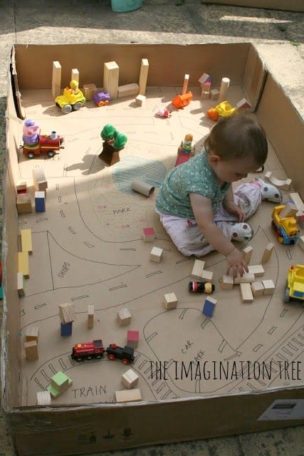 Does Your Child Have Time to Play? Just...Play?Happy toddler play in a cardboard box with blocks!