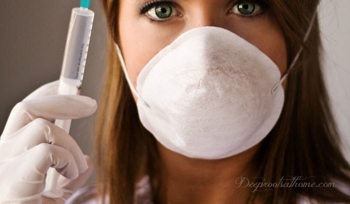 22,000 US Nurses Refuse Flu Vaccines At Expense Of Career. woman wearing face mask