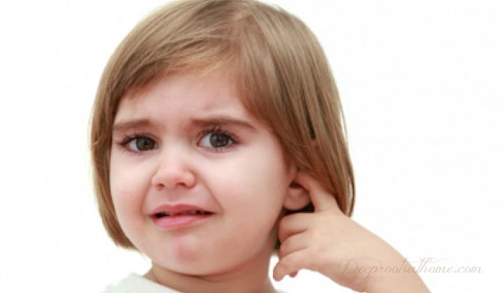 little girl with painful ear infections