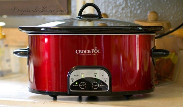 Could Your Slow Cooker Be Leaching Neurotoxic Lead? A red CrockPot