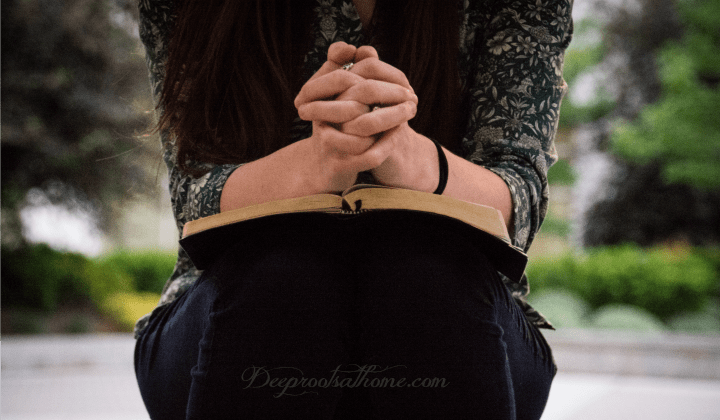 A 30-Day Prayer Challenge: Praying Character Virtues For Your Children Image of a praying woman with Bible in her lap.