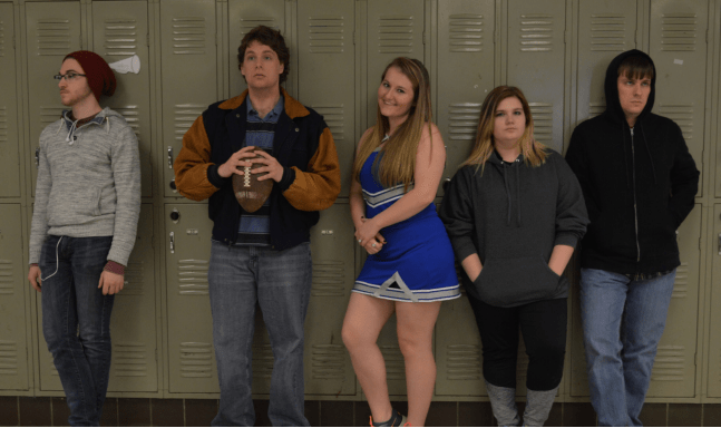 7 Truths Parents & Adults Don't Get About Today's High School 5 kids standing by their lockers in a high school...looking bored.