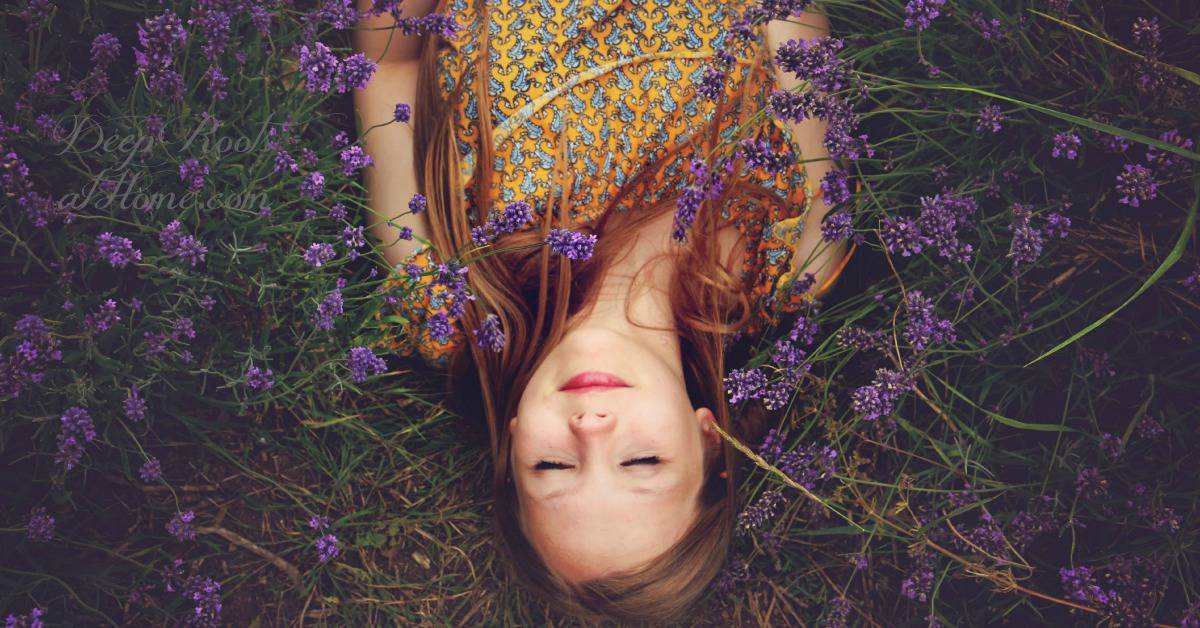 Self Love /Self Care: A Many-Faced Culture: A Young Woman's Warning. Self Love /Self Care: A Many-Faced Culture: A Young Woman's Warning. A smiling beautiful red-haired woman lying restfully on her back, eyes closed, in a field of lavender.