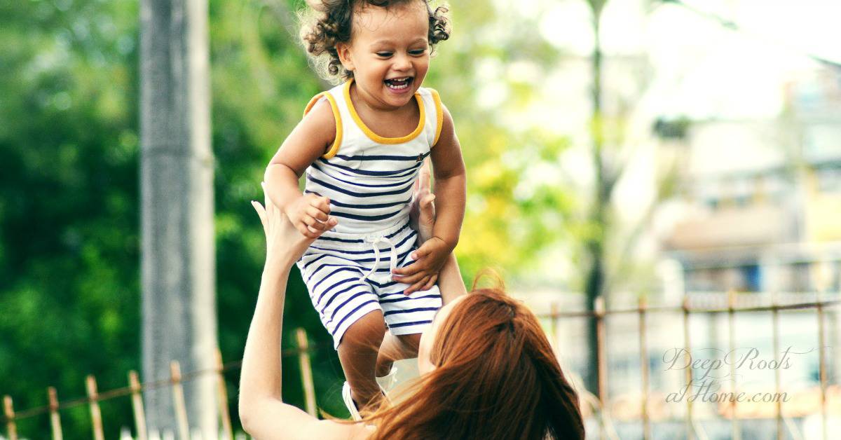 100 Revealing Questions & Conversation Starters For Hands-On Parenting 100 Revealing Questions & Conversation Starters For Hands-On Parenting. A young mom tossing her child up in the air and both are laughing.