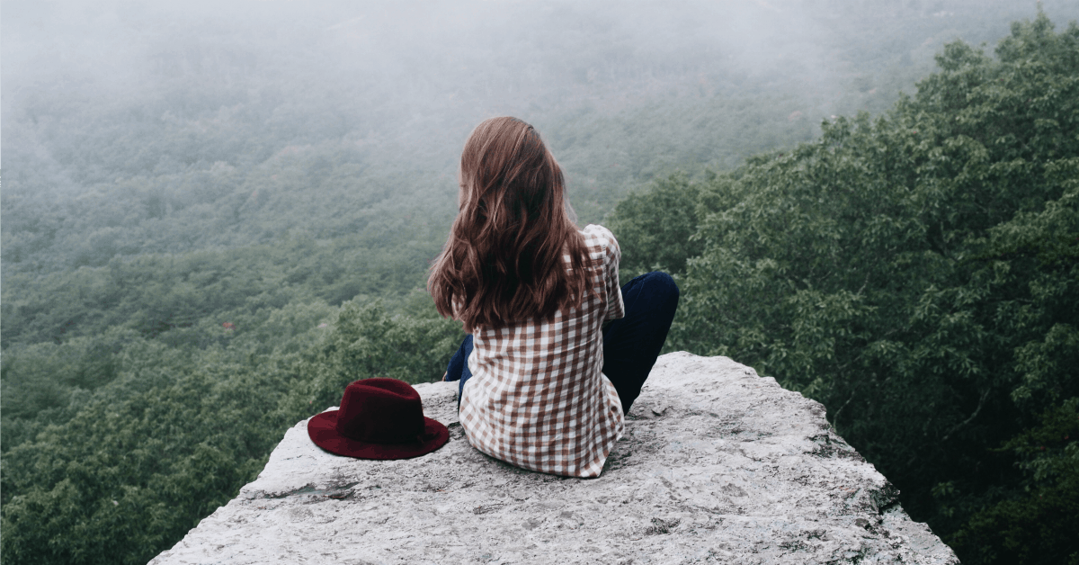 Pulling the Plug on Your TV and Liking It: A Radical Choice! Pulling the Plug on Your TV and Liking It: A Radical Choice! Woman sitting on a high rock looking over the world
