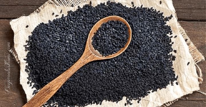 black seed and a wooden spoon